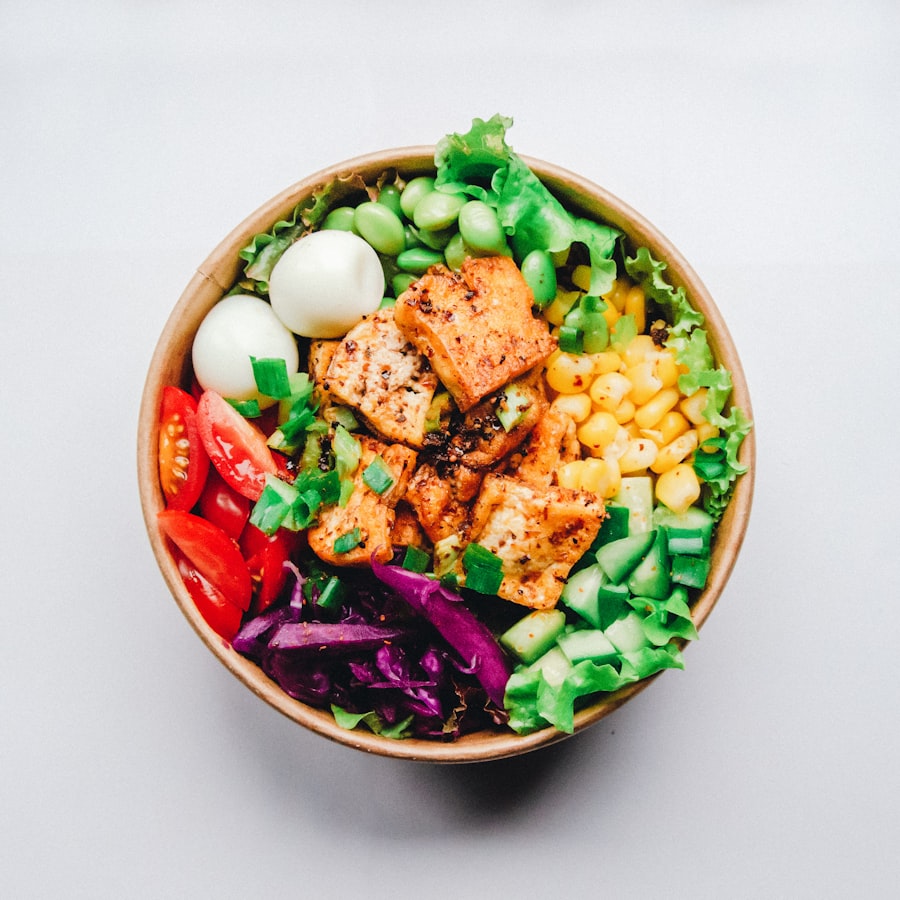 Vibrant rice bowl with crispy chicken bites and fresh asian slaw